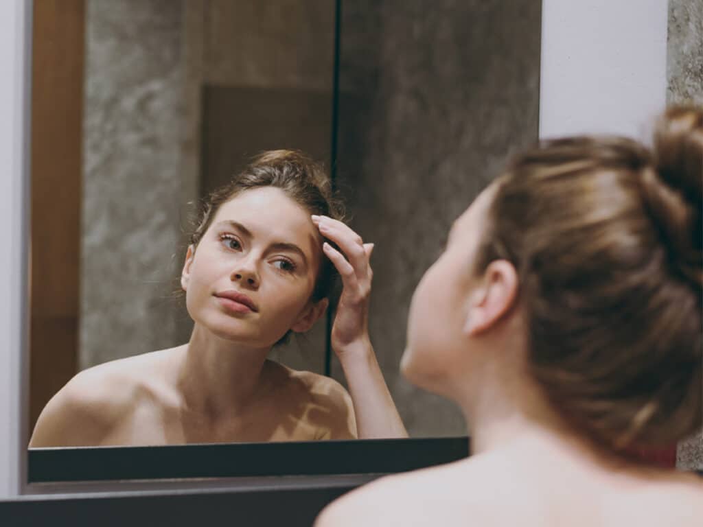 Maintaining a healthy skincare routine, including regular cleansing and moisturizing, is essential to preserving the results of an endoscopic brow lift.