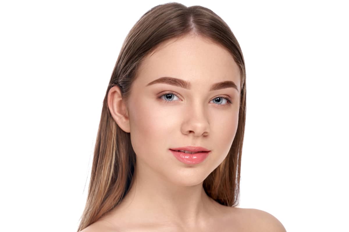 Front-facing portrait of a woman with a rounded nasal tip, used to illustrate the before-state or anatomical structure of a bulbous nose prior to corrective rhinoplasty.